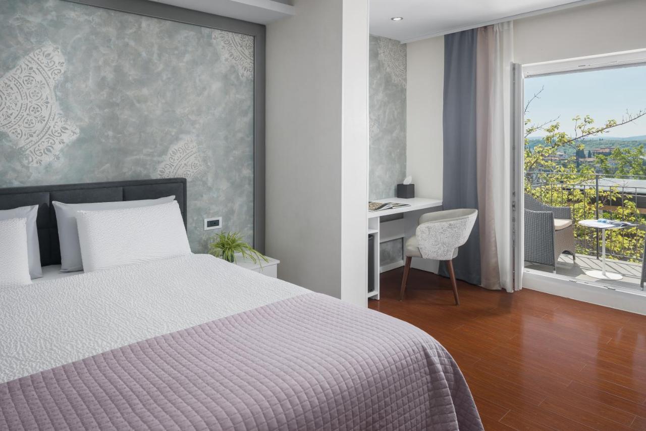 Superior Triple Room Balcony partial Sea View